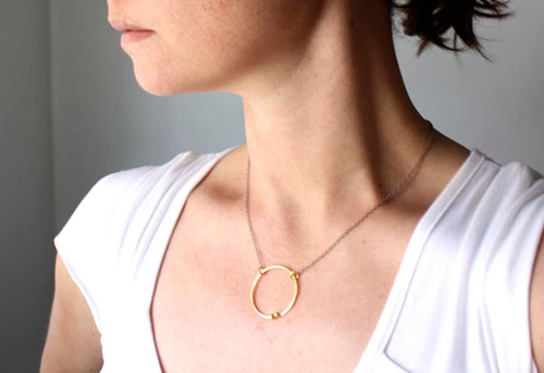 Gold enclosure, circle of the couple necklace in gold and sterling silver