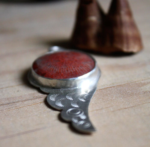 Hiko, bird wing pendant in sterling silver and red coral