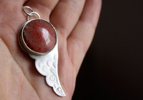 Hiko, bird wing pendant in sterling silver and red coral