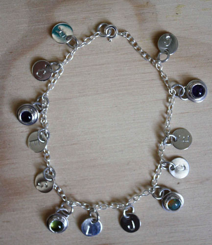 The tree of Jesse, family memory bracelet in silver, amethyst, opal and peridot