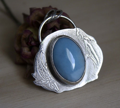 Aquatic ballet, dolphin and whale pendant in silver and larimar