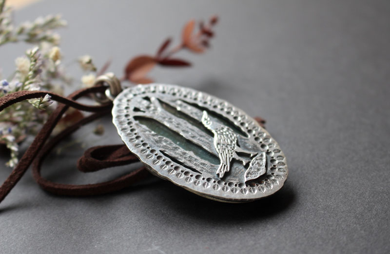 Heart of the forest, raven spirit pendant in silver and labradorite