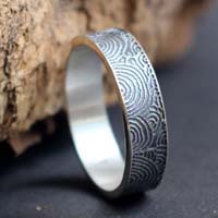 Portal of time, Gavrinis neolithic stele ring in silver