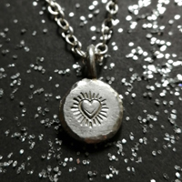 Promise, passionate heart necklace in sterling silver