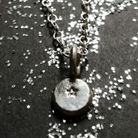 Ray of hope, small star necklace in sterling silver