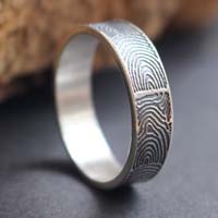 The imprint of the past, neolithic gavrinis cairn ring in silver