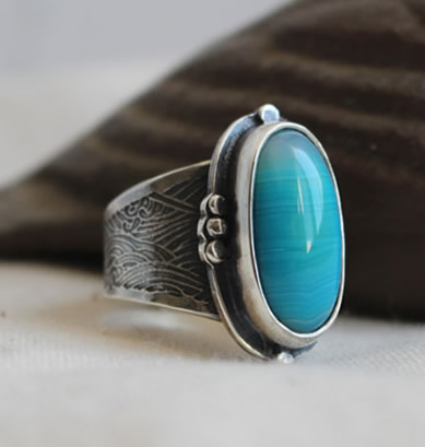 A custom ring inspired by the sea, featuring a blue agate.