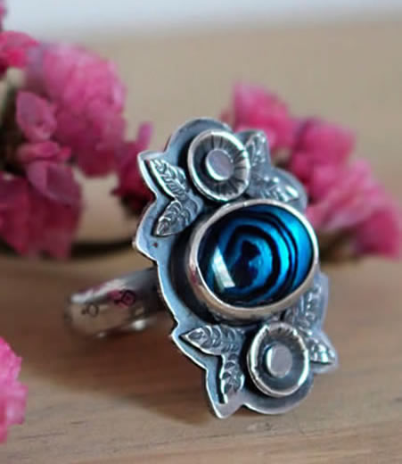 Custom ring with a paua cabochon